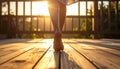 Gentle Light and Motion over Bare Feet on Wood Royalty Free Stock Photo