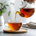 Close-Up of Tea Pouring into Glass Cup with Steam Royalty Free Stock Photo