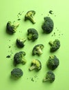 Fresh tasty broccoli on color background, flat lay Royalty Free Stock Photo