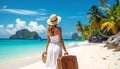A woman in a white dress and straw hat walks along a pristine beach with a rolling suitcase. Royalty Free Stock Photo