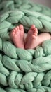 baby legs on green wool blanket Royalty Free Stock Photo