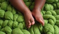 baby legs on green wool blanket Royalty Free Stock Photo