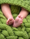baby legs on green wool blanket Royalty Free Stock Photo