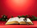 Christmas red background with Bible and rosary on the table Royalty Free Stock Photo
