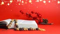 Christmas red background with Bible and rosary on the table Royalty Free Stock Photo