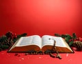 Christmas red background with Bible and rosary on the table Royalty Free Stock Photo