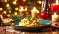 Festive Table Scene with Creamy Holiday Risotto Royalty Free Stock Photo