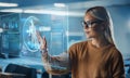 Female Scientist Interacting With Holographic Medical Interface In Modern Lab Setting Royalty Free Stock Photo
