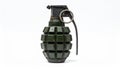A green, segmented hand grenade with a metal safety lever and pull ring. Royalty Free Stock Photo