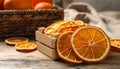 Crate of dry orange slices on wooden table, closeup Royalty Free Stock Photo