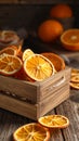 Crate of dry orange slices on wooden table, closeup Royalty Free Stock Photo