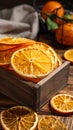 Crate of dry orange slices on wooden table, closeup Royalty Free Stock Photo
