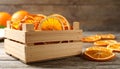 Crate of dry orange slices on wooden table, closeup Royalty Free Stock Photo