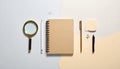 Desk Workspace with Notebook, Pen, Magnifying Glass, and Office Supplies for Study or Work Environment Royalty Free Stock Photo