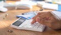 Close-up of Hand Using Calculator for Financial Calculations Royalty Free Stock Photo