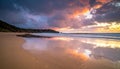 Dramatic Sunset Over a Reflective Beach Landscape Royalty Free Stock Photo