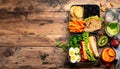 Healthy Lunch Box Assortment on Rustic Wooden Table Royalty Free Stock Photo