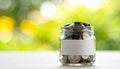 Jar Full of Coins with Blank Label Royalty Free Stock Photo
