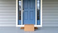 Delivery Package on Doormat Before Blue Front Door, Contactless Delivery Concept Royalty Free Stock Photo