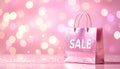 Abstract Pink Bokeh Background with Sparkling SALE Text and Glossy Gift Bag Royalty Free Stock Photo