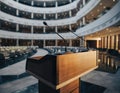 Conference hall podium with microphones empty stage Royalty Free Stock Photo