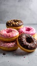 Four fresh donuts on each other Royalty Free Stock Photo