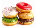 Four fresh donuts on each other Royalty Free Stock Photo