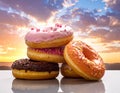 Four fresh donuts on each other Royalty Free Stock Photo