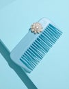 Minimal Elegant Pearl Hair Comb in Pastel Blue Setting Royalty Free Stock Photo