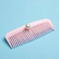 Minimal Elegant Pearl Hair Comb in Pastel Blue Setting Royalty Free Stock Photo