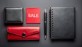 Business Essentials: Sale, Wallet, Pen, and Notebook on Dark Background Royalty Free Stock Photo