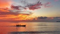 Sunset Silhouette: Boat on the Ocean Royalty Free Stock Photo