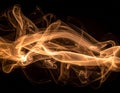 Brown coloured smoke abstract lighting on a black background Royalty Free Stock Photo
