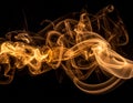 Brown coloured smoke abstract lighting on a black background Royalty Free Stock Photo