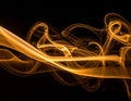 Brown coloured smoke abstract lighting on a black background Royalty Free Stock Photo