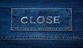 Stitched CLOSE Text on Denim Fabric Casual Texture Royalty Free Stock Photo