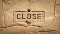 Stamped CLOSE Text on Rough Kraft Paper Natural Texture Royalty Free Stock Photo