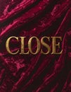 Gold Embossed CLOSE Text on Deep Burgundy Velvet Texture Royalty Free Stock Photo