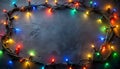 Festive String Lights Border on Dark Textured Background Royalty Free Stock Photo