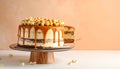 Delicious homemade cake with caramel sauce and popcorn on table against color background Royalty Free Stock Photo