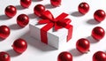 Winter Festive Design. White gift box decorated with a red bow in surrounding by glos Royalty Free Stock Photo