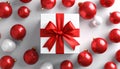 Winter Festive Design. White gift box decorated with a red bow in surrounding by glos Royalty Free Stock Photo