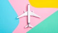Passenger jet airplane, minimal concept, on funny colors paper with geometric shapes. Royalty Free Stock Photo