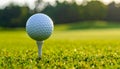 Golf Ball on Tee at Sunset or Sunrise Royalty Free Stock Photo