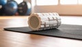 Textured Foam Roller on Yoga Mat in Gym Setting Royalty Free Stock Photo