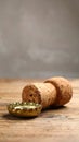 Cork of sparkling wine and muselet cap on wooden table, closeup. Space for text Royalty Free Stock Photo