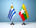 Myanmar and Uruguay flags the relationship with the table, gradient background. Vector Royalty Free Stock Photo