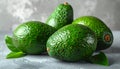 Tasty ripe green avocados on grey background Royalty Free Stock Photo