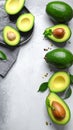 Tasty ripe green avocados on grey background Royalty Free Stock Photo