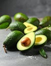 Tasty ripe green avocados on grey background Royalty Free Stock Photo